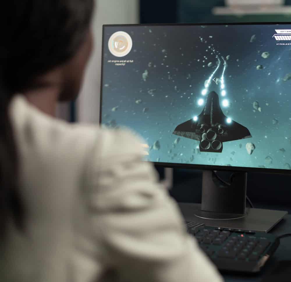 Woman looking at computer screen with animation
