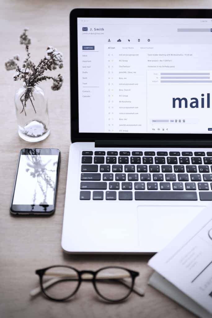 Email and signature on laptop screen